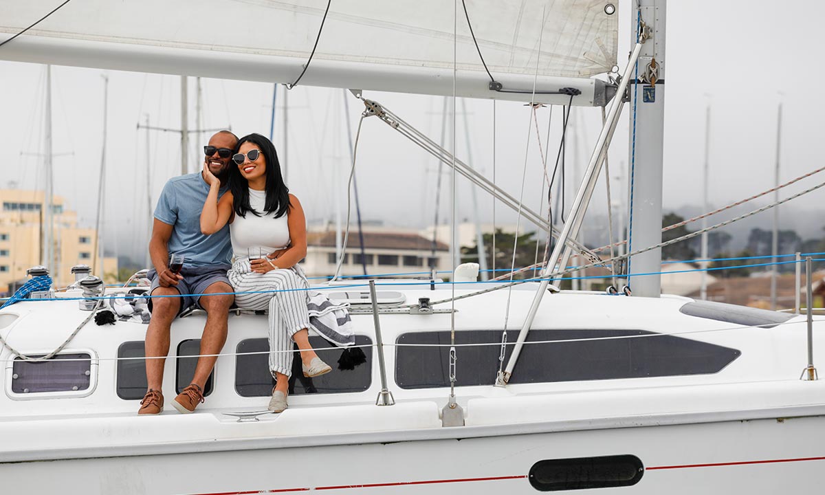 Couple on sailboat.