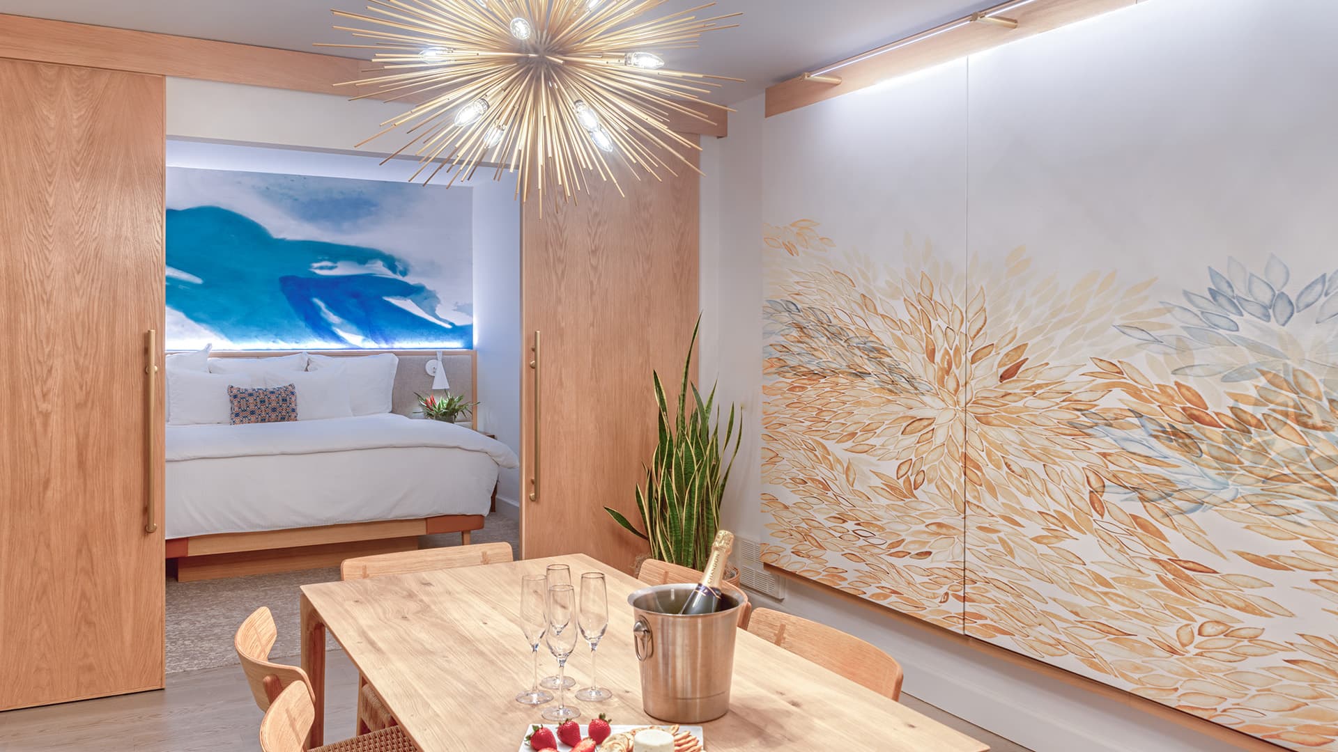 One Bedroom Junior Suite dining and bedroom view.