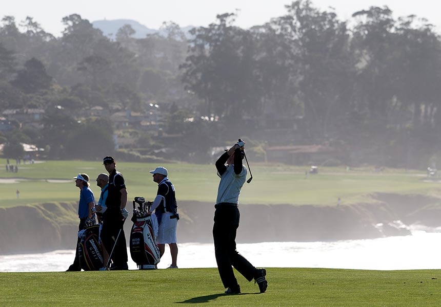 A group playing golf. 