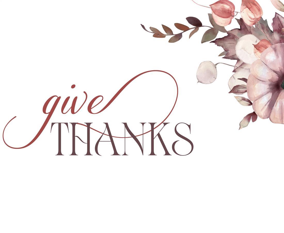 Give Thanks text over a white background with pumpkin and leaves in the background