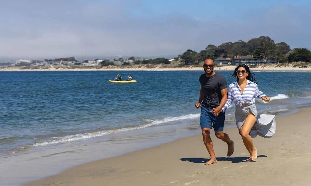 Couple running on the beach