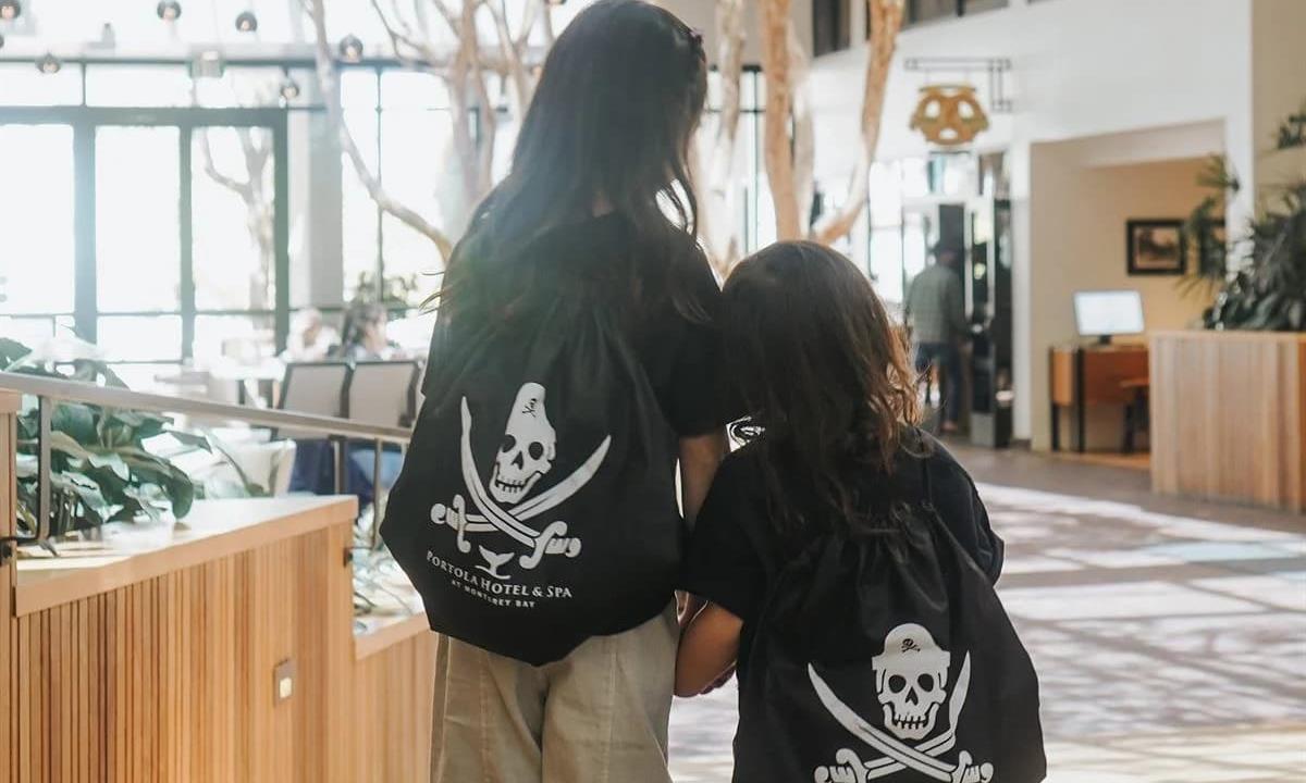 kids with pirate backpacks on