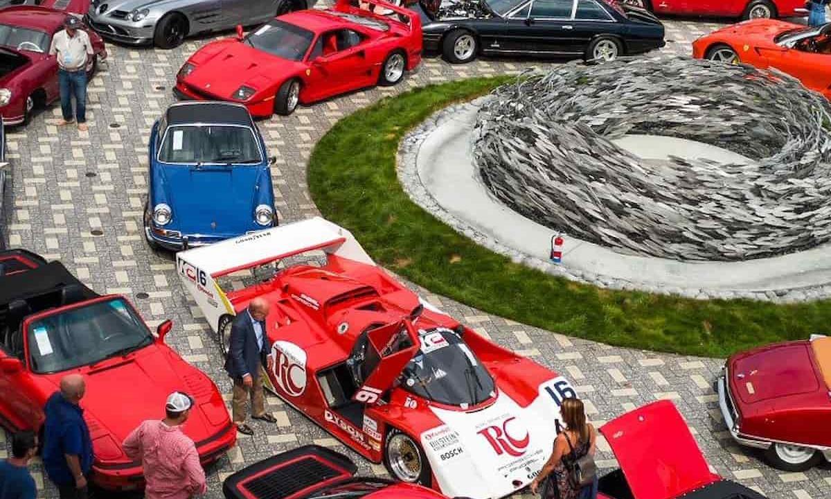 sports cars lined around hotel entrance