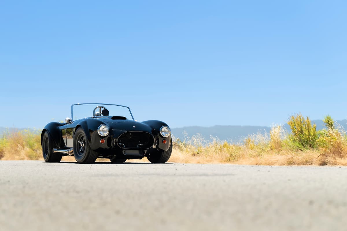 classic car on gravel road