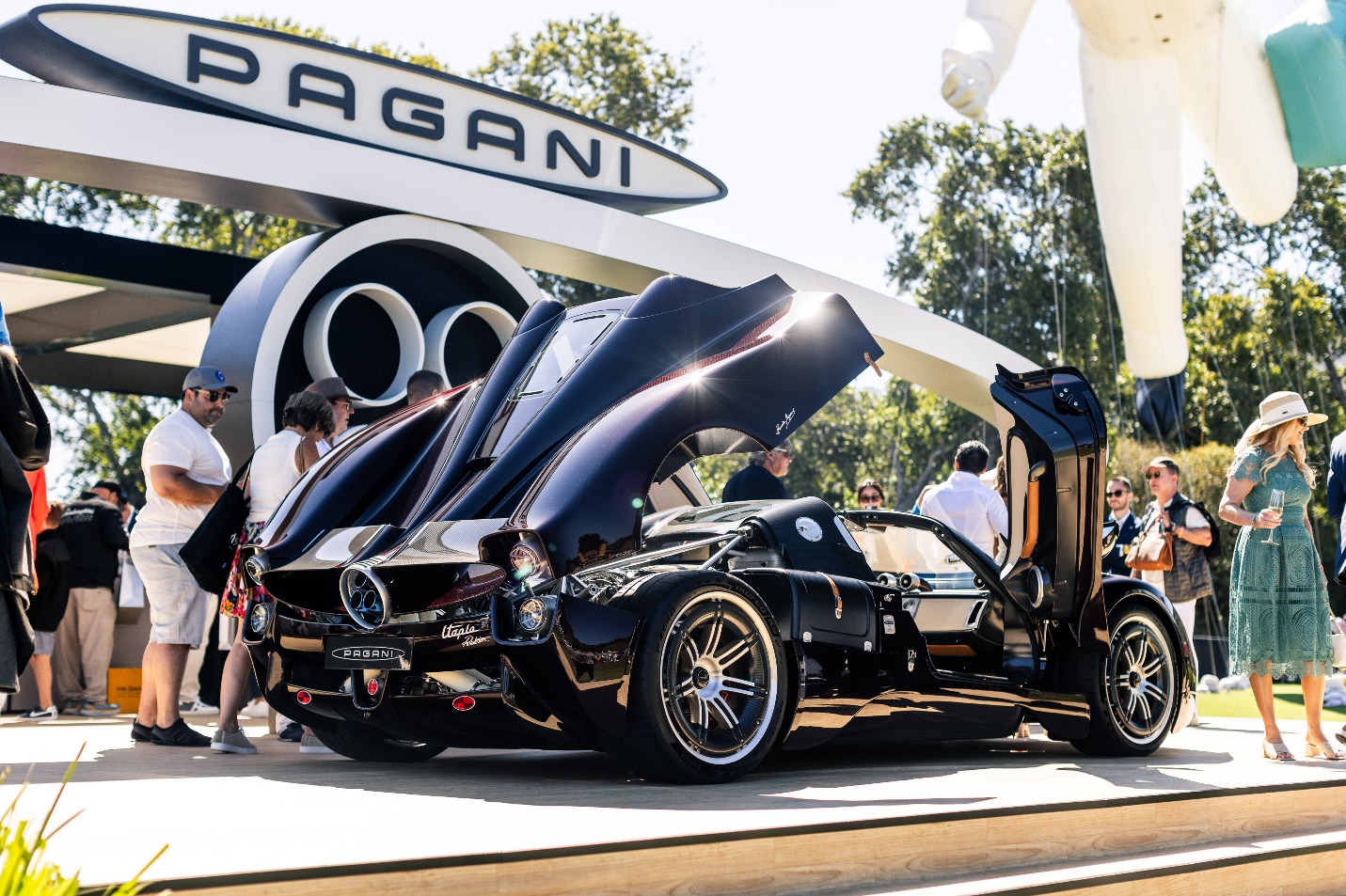 black classic car displayed at car show