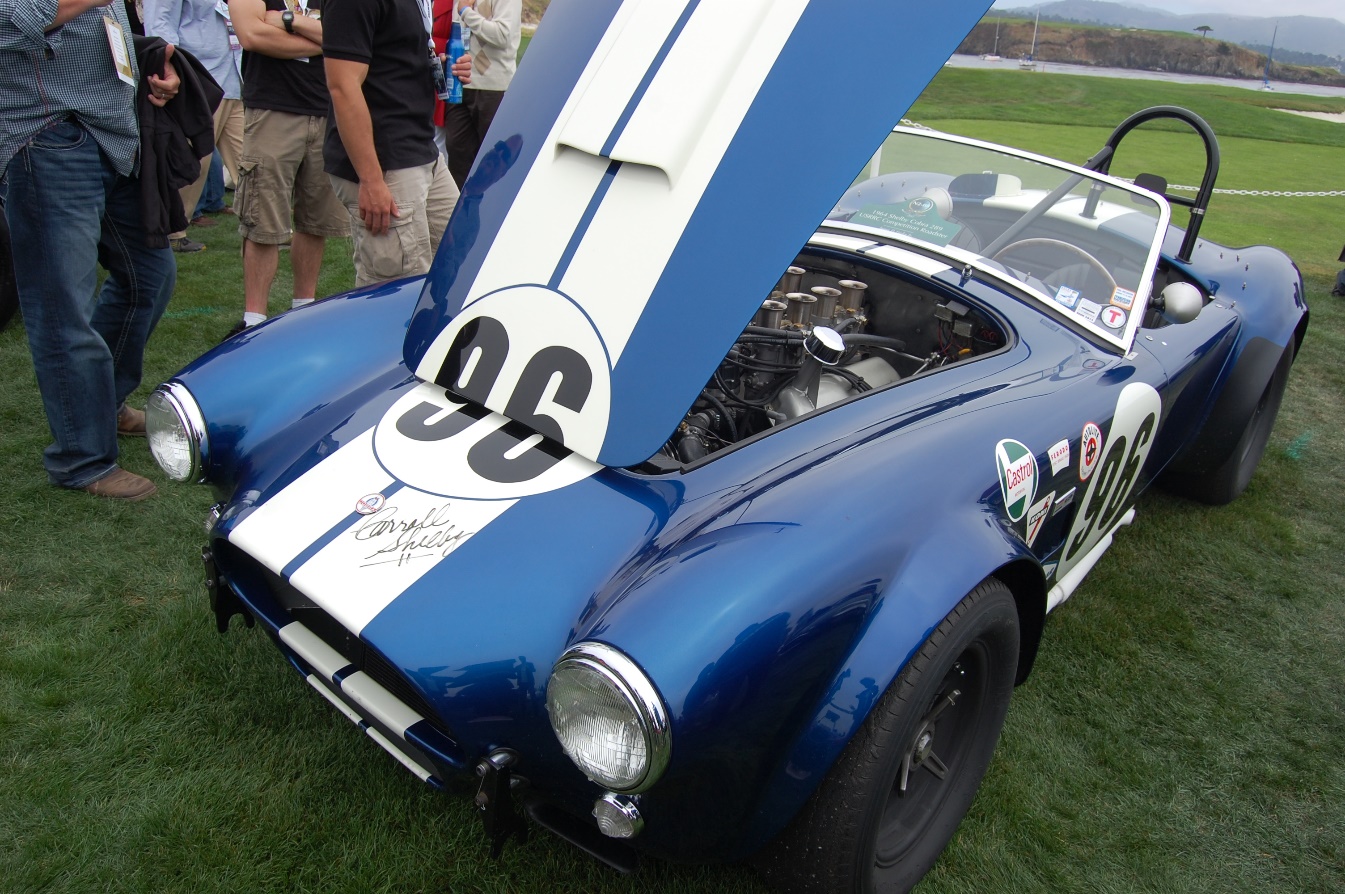 blue sports car at car show