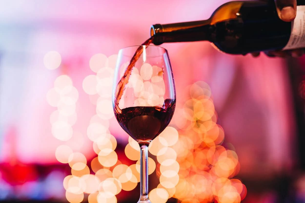 close up of red wine in wine glass