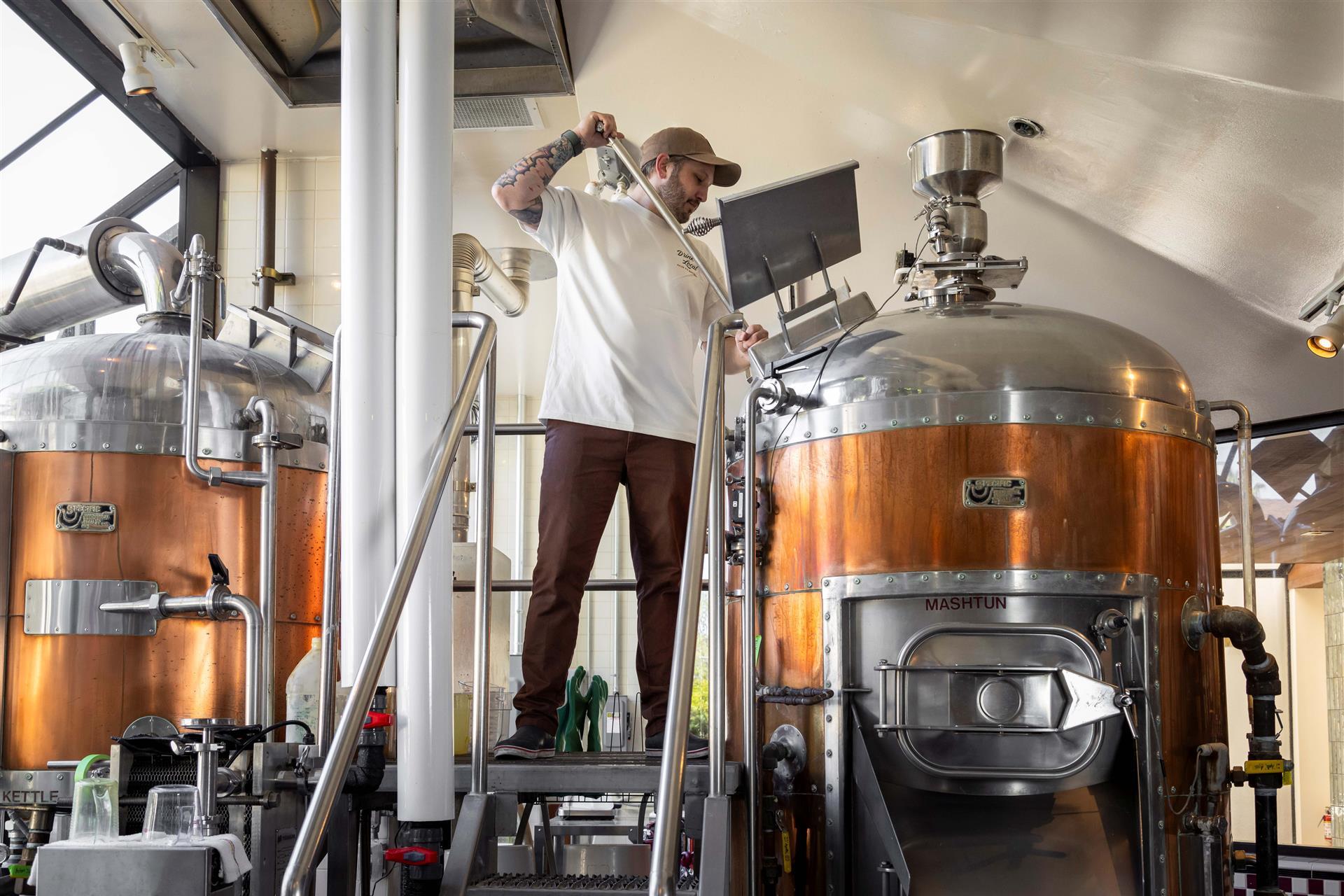 Brewer filling grain. 