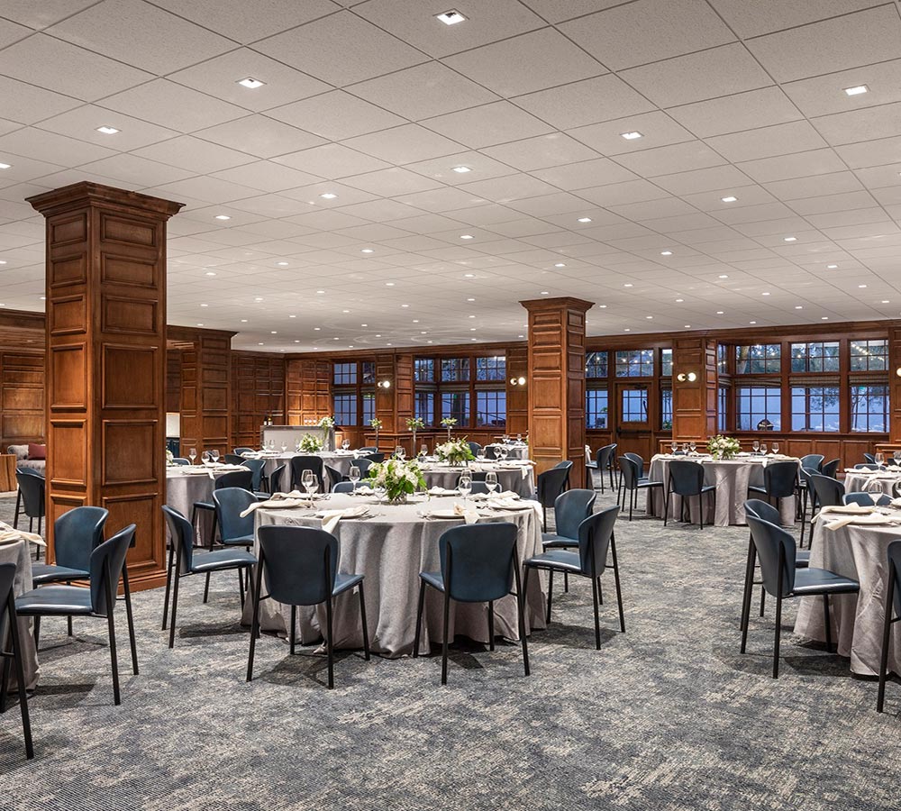The Club Room with inset ceiling lighting and circle tables