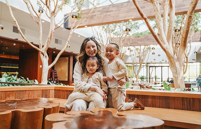Family in the lobby smiling.