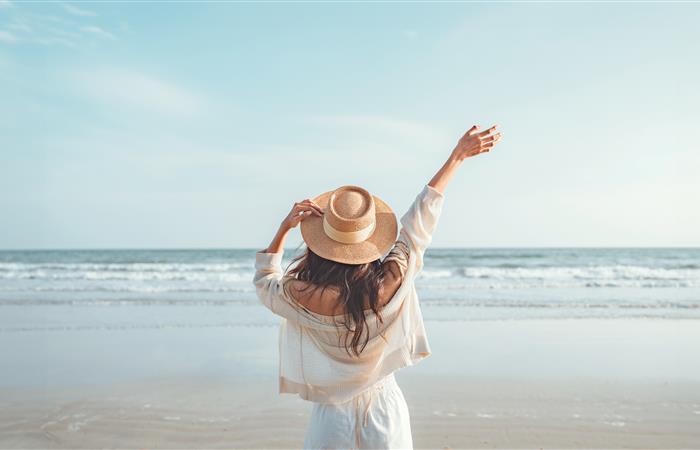 woman standing on a beach