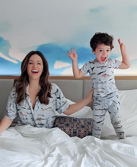 Mother and son with matching pajamas. 